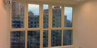 Утепление за счет обшивки пластиком. Установка окон на лоджию с теплым профилем, отделка. 